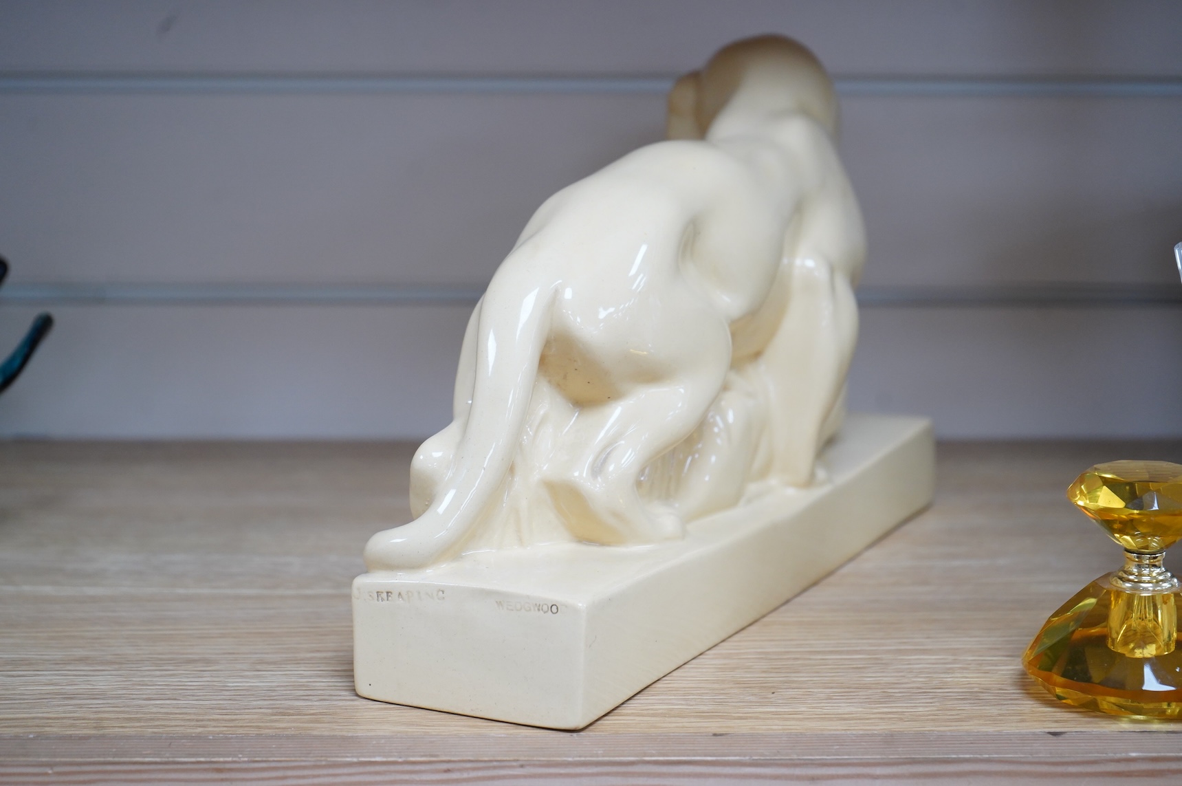 John Skeaping for Wedgwood, Art Deco sculpture of a Tiger with buck, straw glazed, 33cm wide